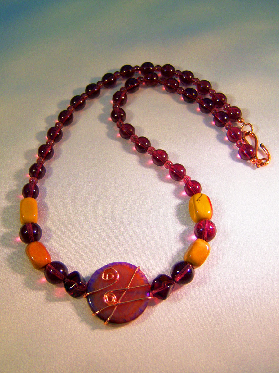 handmade beaded jewellery 431n - 19 inch handcrafted necklace, wrapped focal, amethyst glass and moorkite black beads